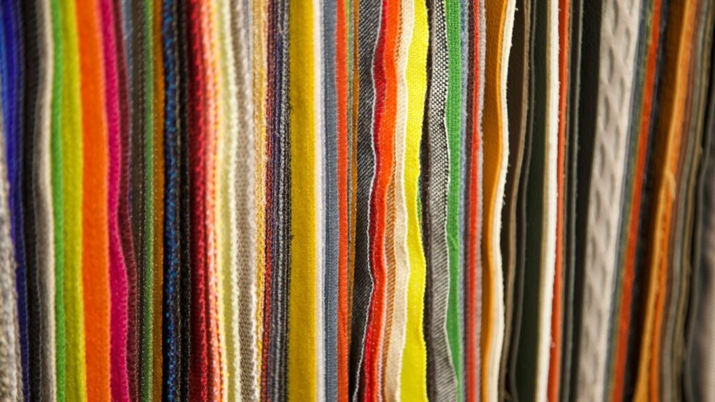 a close up of a bunch of colored pencils